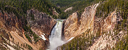 An aerial view of a waterfall in Yellowstone National Park.