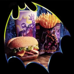 A batman burger and fries with a Batman logo, captured beautifully through professional food photography.