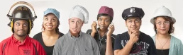 A group of people wearing hats for a charity promo.