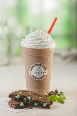 A chocolate milkshake with cookies, whipped cream, and a hint of company headshot flavor.