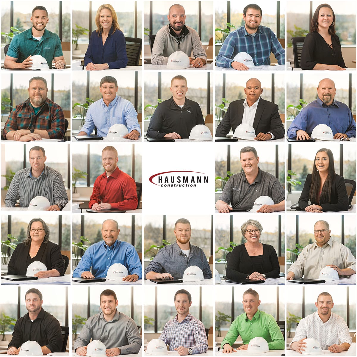 Hausmann Construction team members with hard hats in a professional office portrait grid.
