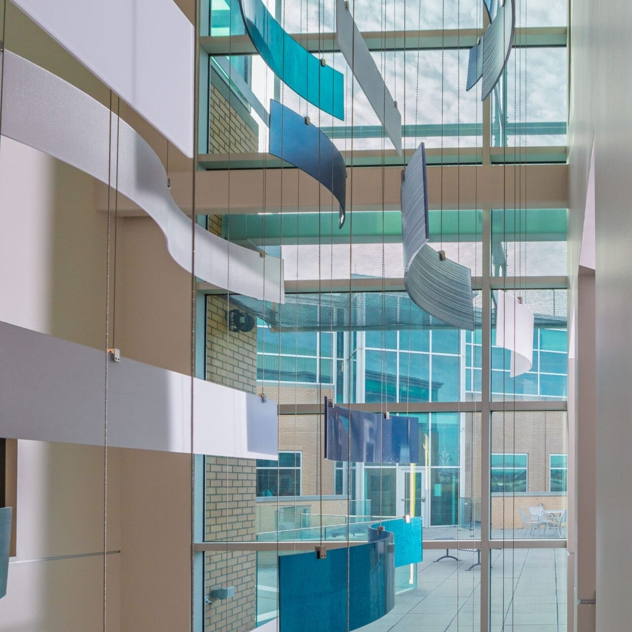 Commercial Real Estate Kinetic Ribbon Sculpture Sunlit Atrium