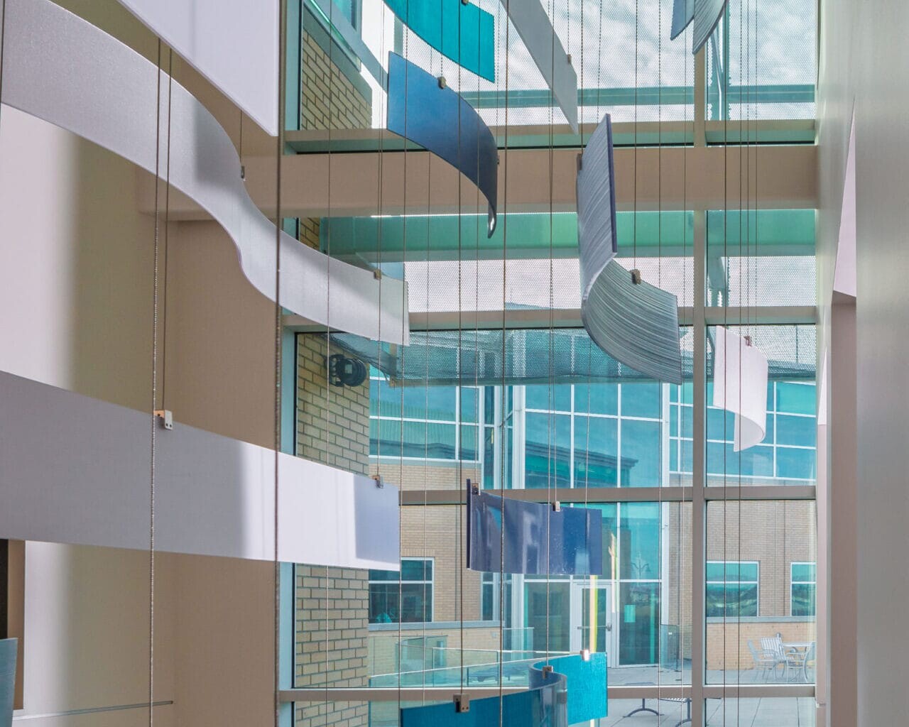 Commercial Real Estate Kinetic Ribbon Sculpture Sunlit Atrium